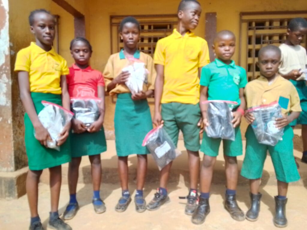 Pupils with donated sneakers